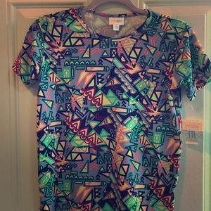 Girls  size 10/12.  Shirts and shorts